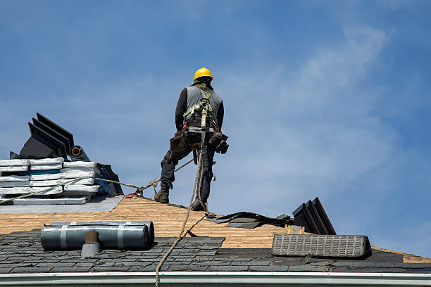 Professional Roof Replacement technician working in Lowman, NY